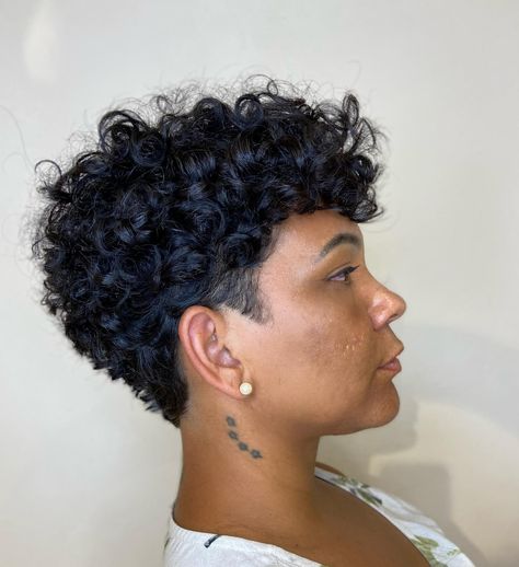 In the mood to switch up your look and your hairstyle? Not too sure what to go for since you’re overwhelmed with different options? If so, keep on rea... Curly Hair Fade Women, Black Women With Short Curly Hair, Short Black Women Hair, Short Curly Haircuts Mixed Women, Short Curly Wedge Haircut, Short Curly Hair Shaved Side, Short Haircuts For Fat Faces, Short Pixie Cut Curly Hair, Short Curly Pixie Cut Black Women