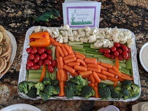 Dinosaur Veggie Tray Dinosaur Veggie Tray Ideas, Dino Birthday Food Ideas, Dino Veggie Tray, Jurassic World Birthday Party Food, Dinosaur Fruit Tray Ideas, Dinosaur Vegetable Tray, Dinosaur Veggie Tray, Dino Fruit Tray, Healthy Dinosaur Party Food