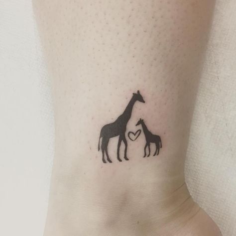 Cute mamma and baby giraffe on inner ankle #freedomtattoos #freedom Outline Heart Tattoo, Animals Tattoo Ideas, Baby Giraffe Tattoo, Giraffe Outline, Small Giraffe Tattoo, Giraffe Tattoo, Freedom Tattoos, Animals Tattoo, New Tattoo Designs