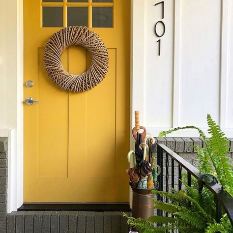 This is my parent’s front door. The color is “Solid Gold”, by Behr. Many people asked last August when I first posted this photo, but I… Bold Front Door Colors, Bold Front Door, Yellow Front Door, Bright Front Doors, Best Front Door Colors, Tan House, Exterior Door Colors, Yellow Front Doors, Best Front Doors