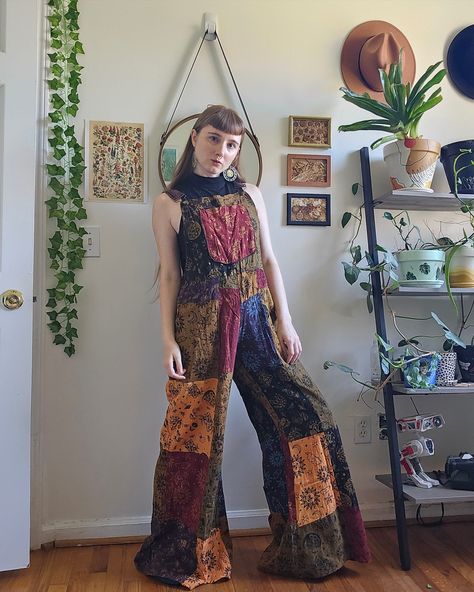 Step into celestial magic with our patchwork wide-leg jumpsuit—boho whimsy at its finest! 🔗https://karmanepalcrafts.com/collections/jumpsuits/products/patchwork-celestial-mushroom-wide-leg-bell-bottom-jumpsuit #celestial #patchwork #wideleg #jumpsuit #70sfashion #90svibes #funkystyle #dungarees #whimsygoth #autumnvibes Boho Overalls Outfits, Mushroom Overalls, Hippie Outfits Plus Size, Practicum Outfit, Goth Hippie Outfits, Patchwork Overalls, Punk Aesthetics, Plus Size Hippie, Wide Leg Overalls