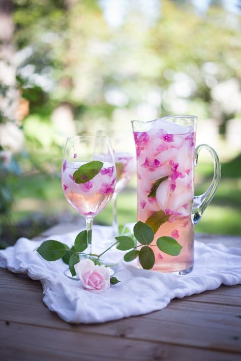 Wild Rose Petal Sangria- a refreshing summer drink that is lightly floral and soothing to the soul | www.feastingathome.com Rose Sangria, Rosé Wine, Rose Flavored, Refreshing Summer Drinks, 31st Birthday, Pretty Drinks, Tea Party Garden, Summer Drink, Summer Refreshments