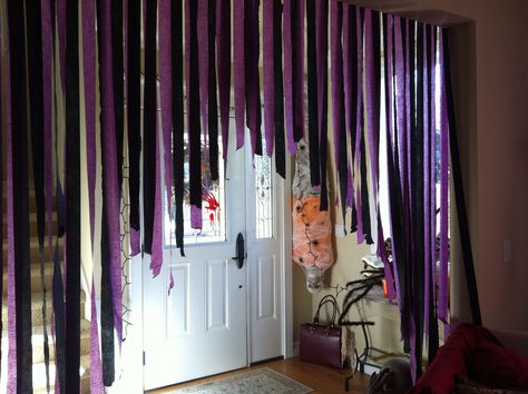 Streamers used to close off a room Streamers Doorway, Streamers On Ceiling Ideas, Halloween Streamers Ideas, Halloween Party Streamer Ideas, Streamers Decorations Ideas, Black Streamers Halloween, Halloween Decorations Streamers, Streamer Halloween Decorations, Ways To Hang Streamers