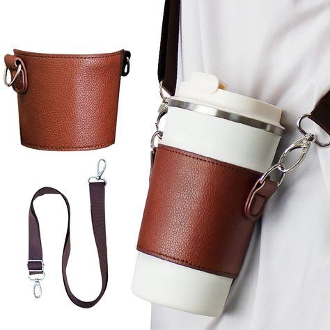 PU Leather Coffee Cup Water Bottle Holder Portable Outdoor Cup Carrier Sleeve Feel free to contact me with additional questions. Have a nice day!  Bullet Points: Easy to Clean and Durable: Our drink carrier is built to last with reliable wear-resistant and easy-to-clean PU leather material. Its durability ensures long-lasting convenience for your daily needs. Very Comfortable: Experience ideal convenience with our drink carrier featuring an adjustable strap design. Enjoy comfortable carrying with various options including over-the-shoulder, crossbody, or by hand. Adjust the strap length to your preference for different back ways. Outstanding Craftsmanship: This drink carrier is made of high-quality material with fine details and neat lines. It is not easy to break or tear, and it does not Leather Kitchen Accessories, Leather Cup Holder, Cup Carrier, Drink Carrier, Leather Kitchen, Leather Accessories Handmade, Coffee Cup Holder, Travel Coffee Cup, Water Bottle Holder