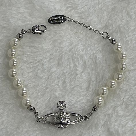 Vivienne Westwood single layer pearl bracelet Viviene Westwood Jewelry, Vivian Westwood Jewelry Aesthetic, Vivviene Westwood Bracelet, Vinnie Westwood Bracelet, Vivien Westwood Jewellery, Vinnie Westwood Jewelry, Vivienne Westwood Bracelet Aesthetic, Vivian Westwood Bracelet, Vivienne Westwood Bracelets