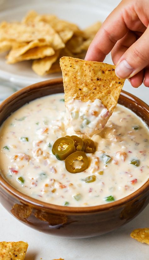 Welcome, food lovers! If you’ve stumbled upon Hatch Chile Queso, consider yourself lucky. This spicy, creamy, melty dip is more than just a dish. It’s an experience, a symphony of flavors that dances on your palate and warms your heart. In this post, you will learn everything you need to know about this delicious dip its origin, how to prepare it, and creative serving suggestions. You are in for a treat!
What is Hatch Chile?
First things first, let’s talk about Hatch chiles. These beloved gree Hatch Chili Queso Dip, Hatch Queso, Green Chili Queso, Chili Queso Dip, Chili Queso, Chili Dip Recipes, Melted Cheese Dip, Chile Relleno Casserole Recipe, Hatch Chilies