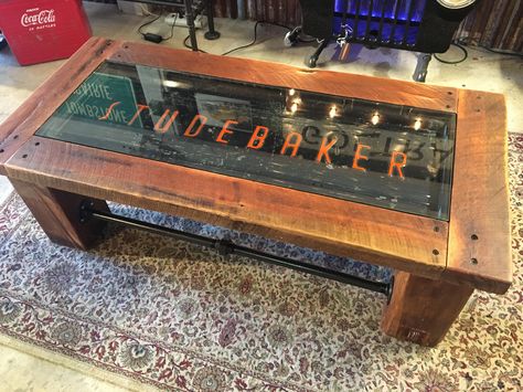 Studebaker tailgate made into coffee table with glass top by furniture Garage Man Cave Coffee Table Ideas, Tailgate Coffee Table, Tailgate Furniture, Old Tailgate Ideas, Automobile Furniture, Man Cave Coffee Table, Truck Tailgate Bench, Tailgate Table, Tailgate Bench