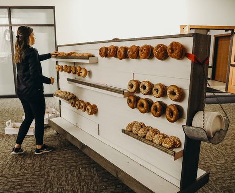 This bagel wall was a huge hit at a previous Winshape event! Bagel Cafe Interior, Bagel Shop Design, Bagel Wall, Commercial Facade, Matcha Bar, Bagel Cafe, Matcha Bars, Bagel Bar, Bakery Shop Design