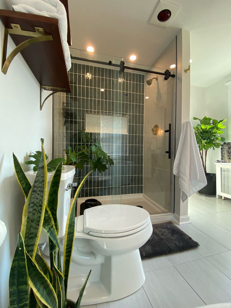 Turn your bathroom into a lush urban garden with trending biophilic touches! Using plants as natural décor, it adds an organic design while also being environmentally conscious. By using DreamLine’s Enigma-XO Frameless Sliding Shower Door, it’s striking design and stainless-steel hardware delivers a perfect mix premium quality and urban style. Whether your bathroom project is large or small, DreamLine can provide the ultimate solution for your renovation! Biophilic Bathroom, Tiles Toilet, Marble Bedroom, Casa Container, Sliding Shower Door, Bathroom Inspiration Decor, Bathroom Renos, Shower Door, House Bathroom