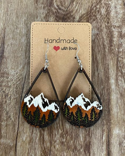 Natural cowhide Earrings with mountains and trees Wood Earring Ideas, Cowhide Earrings, Mountains And Trees, Mountain Earrings, Wood Earring, Earring Ideas, Wood Earrings, Leather Earrings, Wood Burning