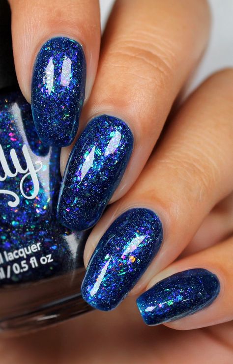 Starrily The Crab Nail Polish by Kelli Marissa • The Crab is a blue jelly nail polish full of colorful flakies and subtle holo.• Multidimensional look, opaque in 2-3 coats.• Created in collaboration with Kelli Marissa as part of The Galaxy Crate series. Description: The Crab is named after The Crab constellation and contains a blue jelly base filled with beautiful rainbow, color shifting flakies and a subtle holographic effect. Application: Best applied in 2-3 coats and finished with a clear top Crab Constellation, Kelli Marissa, Jelly Nail Polish, Eyes Style, Cute Nail Colors, Jelly Nail, Magic Nails, Daisy Nails, The Crab