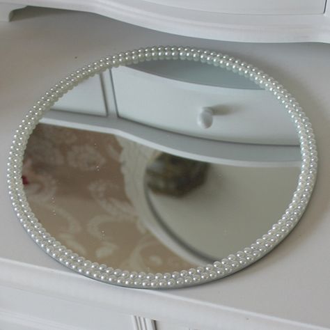 Round Pearl Mirrored Plate  Beautiful wedding centrepiece idea  Ideal as a candle plate or for displaying a centrepiece  Pearl detailing around the edges  Measures: 20.5cms in diameter  http://www.melodymaison.co.uk/product.php?productid=19897=265=1 Mirror Plate Decor Ideas, Mirror Plate Centerpiece Wedding Ideas, Nikah Mirror Plate, Pearl Mirror Diy, Round Mirror Decor Ideas, Draps Design, Decorated Mirror, Pearl Mirror, Girls Room Diy