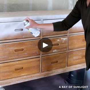 Spray Painting a Dresser | A Ray of Sunlight - Painted Furniture & DIY posted a video to playlist Furniture Makeovers. | By A Ray of Sunlight - Painted Furniture & DIY | Can you spray paint furniture?
Yep, you can. Today, I'm sharing how to and what you can
expect. Alright, here's the dresser we're working on today.
It has oak veneer on it so I'm going to have to address that
before I spray paint it. I'll show you what I mean in a
second. First, we cleaned all of the dust, oils, and grime
off of the dresser with some crud cutter and a damp rack. We
clean every single piece before we paint so that the paint will
stick to the furniture better. And then we filled the wood
grain. If your furniture doesn't have deep wood grain
like this oak does, then you can just skip this step. I mix
some wat Spray Painting Furniture, Painting A Dresser, Spray Paint Wood, Spray Paint Furniture, Painting Wood Furniture, Painted Furniture Diy, Furniture Details Design, Diy Posts, Diy Cans