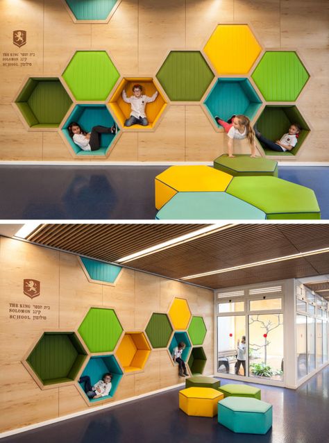 19 Ideas For Using Hexagons In Interior Design And Architecture // This elementary school has a play area featuring hexagon cubbies big enough to play in. Beehive Interior Design, School Waiting Area Design, School Waiting Area, Elementary School Ideas, Wall Nooks, Library For Kids, Education Design Interior, Play Wall, Kindergarten Interior