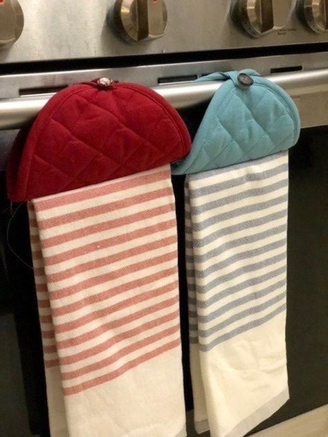 The dish towels in my kitchen are always falling on the floor. It’s so annoying! I tried a simple and inexpensive hack to keep my kitchen towels hanging and off the floor. This hack is not only useful, it’s pretty, too! I only needed some simple dish towels and pot holders (with their own loops) for my project. I started out by folding the dish towel in thirds so it was about the same width as the pot holder. I then folded both the dish towel and pot holder in half (from top to bot… Fold Kitchen Towels, Turned Candlesticks, Small Kitchen Hacks, Kitchen Towels Hanging, Tea Towels Diy, Hanging Kitchen Towel, Pottery Barn Inspired, Craft Stash, How To Fold