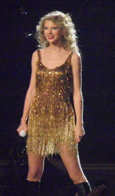 "i have to believe in love and i have to believe in fairy tales" Sparks Fly Outfit, Taylor Swift Iconic Concert Outfits, Taylor Swift Sparks Fly Outfit, Taylor Swift Sparkly Outfit, Taylor Swift Concert Looks, Taylor Swift Performance Outfits, Fearless Taylor Swift Aesthetic Outfits, Taylor Swift Sequin Dress, Taylor Swift Speak Now Tour Outfits