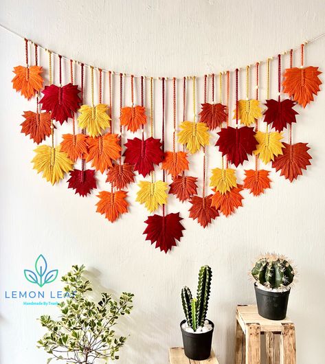 Welcome to my Etsy store. This colorful wall mural is a unique piece of our craft. A boho painting will be the highlight of your home. The product is 100% handmade with eco-friendly cotton yarn that is safe for you and your family. Product details: Color: many colors. Size: W: 57 inches ~ 145cm H: 37 inches ~ 95cm (from the hanging tree to the end of the longest leaf). Please message us if you have custom requirements for color and size. NOTE: - The color may vary a little bit due to screen settings. - The size may vary a bit due to the natural of individual handmade products. - The natural driftwood varies in shapes. - The wooden beads vary in shapes and color upon available. #Wall Decor, Bohemian Wall Decor, Boho Wall Hanging, Scandinavian Decor, Macrame Wall Hanging, Wall Art, Gifts For Yarn Leaf Diy, Wall Photo Display, Window Bookshelf, Macrame Leaf Wall Hanging, Leaf Art Diy, Maple Leaf Necklace, Autumn Wall Decor, Colorful Macrame, Macrame Decoration