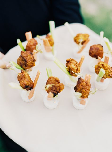 Hot wings and BBQ wings are another favorite, and if you don't want them fried, you can have them baked. Going boneless makes less of a mess, which guests, vendors, and your venue will appreciate. This wedding served tasty wings in cups with celery and carrots. Fall Farm Wedding, Wedding Finger Foods, Maine Fall, Cocktail Hour Food, Boneless Wings, Fall Farm, Bbq Wings, Wedding Appetizers, Carnival Food