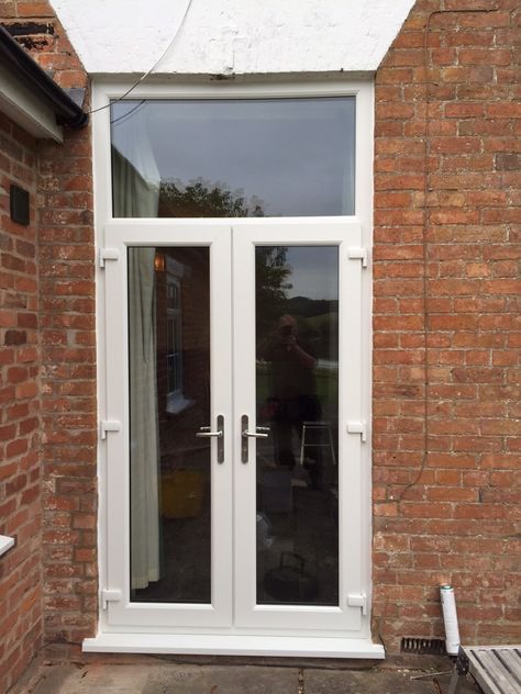 White uPVC French doors with 'A' rated double glazed units. French Doors White, Upvc Patio Doors, Upvc French Doors, External French Doors, Kerb Appeal, White Windows, Greater Manchester, Garden Doors, Park Avenue