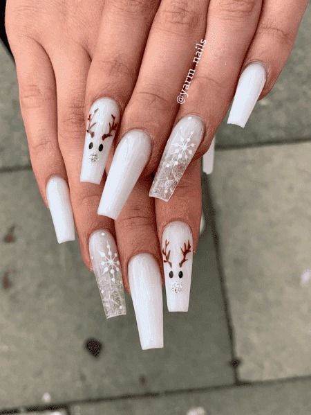 It can be anything, as long as it's holiday-themed! Christmas Nails Simple Acrylic, Simple Christmas Coffin Acrylic Nails, Cute White Winter Nails, Christmas Nails 2023 White, Milky White Winter Nails, Nokti Za Bozic, Christmas Nails White And Gold, White Nails Christmas Design, Clear Christmas Nails