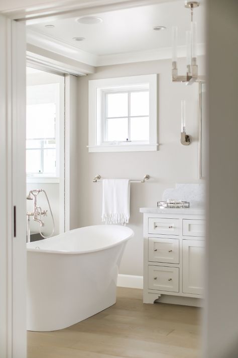 Collonade Gray by Sherwin Williams is the paint color on walls of this glorious and serene bathroom by Melissa Morgan Design. #paintcolors #collonadegray #sherwinwilliams #paintcolors Benjamin Moore Bathroom, Decorators White Benjamin Moore, Best Gray Paint, Benjamin Moore Gray, Best White Paint, Farmhouse Paint Colors, Revere Pewter, Bathroom Paint Colors, Paint Colors Benjamin Moore