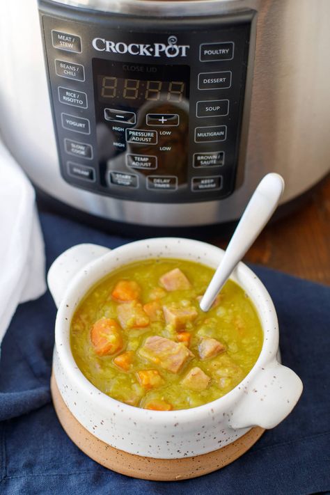 Pressure Cooker Split Pea Soup with Ham Recipe - This delicious split pea soup is hearty and simple to make in your pressure cooker! Split Pea Soup Ham Bone, Soup Ham Bone, Pressure Cooker Split Pea Soup, Soup In Pressure Cooker, Instant Pot Split Pea Soup, Instant Pot Split Pea, Soup Ham, Split Pea Soup With Ham, Pea Soup With Ham