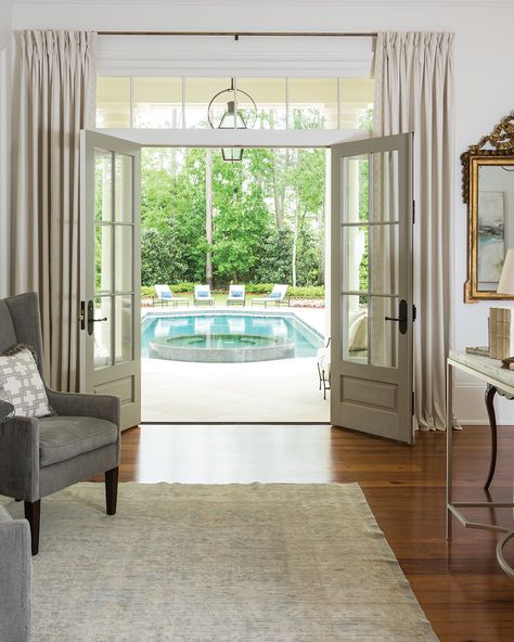 Billowy drapes in raw silk frame French doors that lead out to a lovely pool terrace.   (���📸: Sara Essex Bradley, Connie Seitz) Kitchen French Doors With Curtains, Drapes On French Doors, French Doors With Curtains Interior, French Doors To Porch, French Doors Off Bedroom To Deck, French Door With Curtains, Drapes Over French Doors, French Doors To Patio, French Doors To Patio From Master