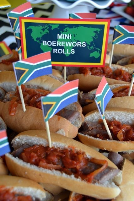 Mini South African Boerewors Rolls South African Heritage Day Decor Ideas, Heritage Day Decor South Africa, South African Decor Ideas, South African Platters, South Africa Theme Party, South African Themed Party Decor, Springbok Party Ideas, South African Party Theme, South African Decor Party