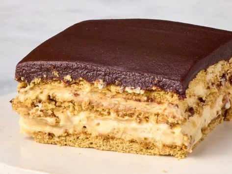 Peanut Butter Chocolate Éclair Cake (No-Bake) | The Kitchn Peanut Butter Eclair Cake, Peanut Butter Eclair, Chocolate Layer Dessert, Chocolate Eclair Cake, Pastry Stand, Double Chocolate Muffins, British Desserts, Eclair Cake, Chocolate Peanut Butter Pie