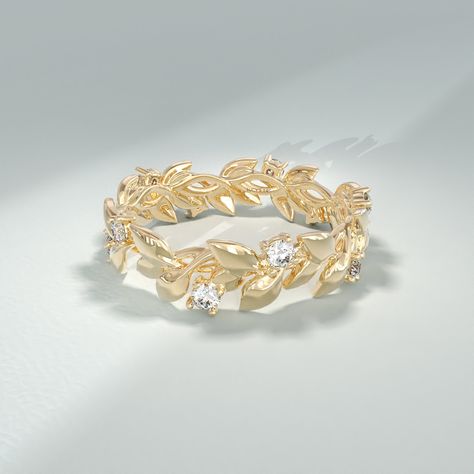 Embrace the beauty of nature with the Diamond Ivy Ring, a stunning piece of jewelry that exudes elegance and charm. Crafted in 14k 18k 10k solid gold with meticulous attention to detail, this ring is designed to captivate with its leafy vine-inspired design. The ring can be made with yellow, rose, or white gold, please choose your size from the dropdown menu options above. 𝐑𝐢𝐧𝐠 𝐃𝐞𝐭𝐚𝐢𝐥𝐬: ❥ Solid gold, available in 10, 14 & 18 karats. ❥ Gold Color Options: White Gold, Yellow Gold, Rose Gold ❥ Band Width: 4.40 mm ❥ Thickness: 2.10 mm ❥ Gemstone: Genuine White Diamond ❥ Gem Color and Clarity: G Colour SI Clarity ❥ Total CTW: 0.325 ctw 𝐂𝐮𝐬𝐭𝐨𝐦𝐢𝐳𝐚𝐭𝐢𝐨𝐧: We would be delighted to accommodate any customization requirements you have, simply get in touch and let us know what you Gold Leaf Wedding Band, Ivy Ring, Thick Band Ring, Leaf Wedding Band, Botanical Ring, Gold Leaf Rings, Rose Gold Band, Pink Jewelry, Ring Women