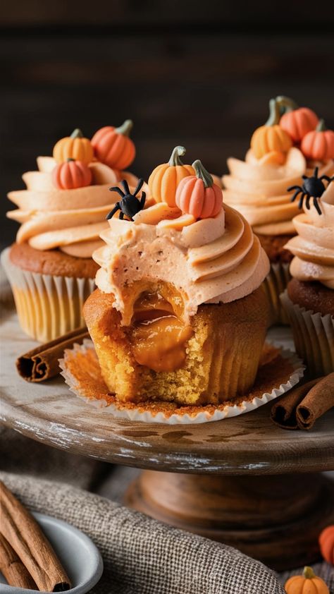 Pumpkin Patch Explosion Cupcakes Fall And Halloween Cupcakes, Pumpkin Cake Filling Recipes, Pumpkin Filling For Cake, Spiced Pumpkin Cupcakes, Pumpkin Filled Cupcakes, Food Photography Cupcakes, Pumpkin Spice Cupcakes From Box Cake, Fall Filled Cupcakes, Stuffed Pumpkin Cupcakes