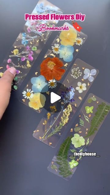 "Cᵣₐfₜ ᵢₙdₑₑd" on Instagram: "Hey Everyone, What do u think about these fabulous bookmarks made out of Pressed Flowers! 
We can use them in copies, books or diaries! 
They look super cute!! And this tutorial is so easy to make. 
You just need some pretty flowers....!! 🌸🌼
Try this today! 
Don't forget to follow my page for more interesting videos and DIY'S AND CREATIVITY.
.
.
.
.#trending #art #artist #artistsoninstagram #trendingnow #diycrafts #craftastherapy #diyprojects #creator #trendy #craft #post #explorepage✨ #explorepage #explorar #likesforlike #reelkarofeelkaro #fypage #fypシ #fy #trendy #pressedflowerart #pressedflowers #diygame #diwalidecorations #diyhomedecor #diyideas #tutorials #tutorial" Pressed Flower Bookmark Diy, Flower Bookmark Diy, Trendy Bookmarks, Pressed Flower Bookmark, Pressed Flowers Diy, Interesting Videos, Flower Bookmark, Trending Art, Diy Bookmarks