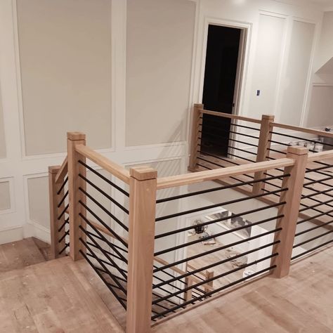 🌊 Introducing the latest gem in our Ocean Stair Rails collection: A sleek blend of functionality and style, featuring a modern horizontal black metal railing. Paired with sturdy metal balusters and topped with a luxurious wood rail, this design is framed by square posts that exude contemporary elegance. 🖤🪵 The contrast of black metal with the warmth of wood brings a unique aesthetic to any space, harmonizing with both modern and traditional interiors. This project not only elevates the home’... Horizontal Stair Railing Wood, Modern Railing Indoor, Black Metal Railing, Black Stair Railing, Indoor Railing, Metal Balusters, Iron Spindles, Stair Rails, Modern Railing