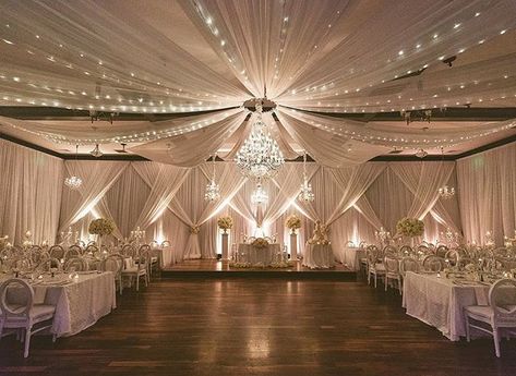 Crisp lines, bright natural tones, and crystal chandeliers! 😍 #signaturechandeliers #wedding #chandeliers #weddingchandelier #weddingchandeliers #weddingdecor #weddinginspiration #weddinginspo #realwedding #instawedding #floridawedding #floridaweddings #orlandowedding #orlandoweddings 📷 @cptphoto Chandelier Wedding Decor, Wedding Drapes, Wedding Chandeliers, Reception Ceiling, Champagne Decor, Quince Themes, Draping Wedding, Wedding Ceiling, Wedding Hall Decorations