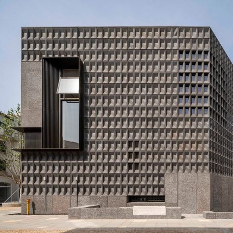 Neri&Hu designed the Aranya Art Center for the Gold Coast seaside resort in China. A patterned exterior is formed from  modular faceted concrete blocks, some of which have openings to let light inside. Neri And Hu, Dream Hotel, Neri Hu, Internal Courtyard, Courtyard House, Cultural Center, Facade Design, Facades, Architect Design