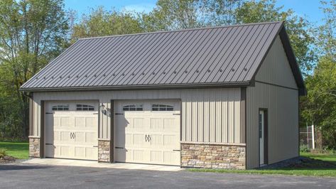 2—10' x 8' Insulated Carriage Style Doors 1—3068 9-Lite Entry Door 2—3' x 3' Sliding Windows Snow-guards 5" K Gutters and Downspouts 12" Eave and Gable Overhangs 36" Versetta Stone Front 8/12 Pitch Walls: Clay Roof: Bronze Trim: Bronze Sheds With Garage Door, Pole Building Garage, Steel Garage Buildings, Versetta Stone, Building Garage, Metal Pole Barns, Garage Shop Plans, Metal Garage Buildings, Pole Barn Plans