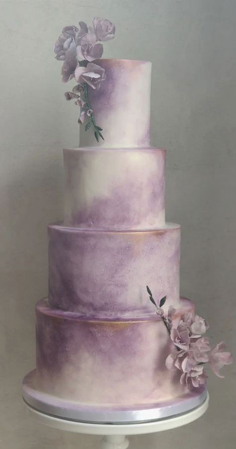 watercolour wedding cake, wedding cake ideas, wedding cake designs, four tier wedding cake, white wedding cake Lavendar Cakes Wedding, Lavender And Silver Wedding Cake, Wedding Cake Designs Lavender, Wedding Cake Purple And White, Sage Green And Lilac Wedding Cake, Lavender Cake Wedding, Lavender And Pink Wedding Cake, Lavender And White Wedding Cake, Lavender Wedding Cake Lilacs