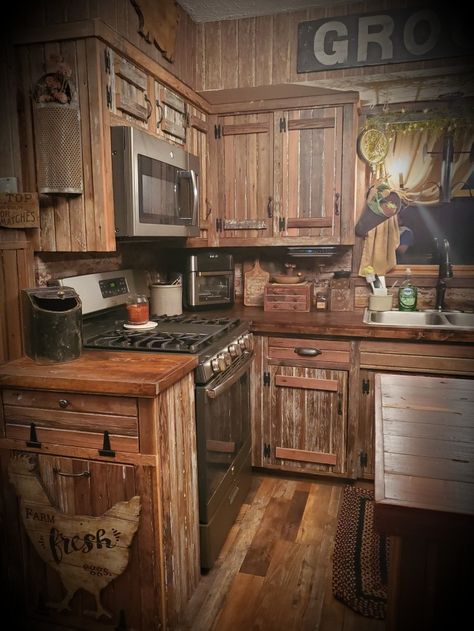 Reclaimed barn wood kitchen cabinets Wallrabenstein 2019 ❤ Rustic Cabin Kitchen Cabinets, Old Rustic Kitchen, Pallet Cabinets Kitchen, Reclaimed Wood Cabinets Kitchen, Rustic Cabinets Kitchen, Burnt Wood Kitchen, Barn Cabinets, Reclaimed Wood Kitchen Cabinets, Barn Door Kitchen Cabinets