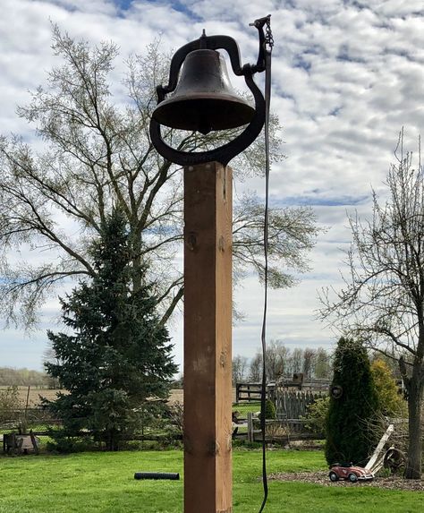 Cast Iron Bell On Post, Farm Bell On Post, Dinner Bell Post, School House Bell, Rustic Yard Decor, Cabin Porches, Cast Iron Bell, Landscaping Around House, Diy Dinner