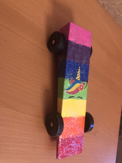 Rainbow unicorn pinewood derby car Unicorn Derby Car, Girl Pinewood Derby Cars, Pine Derby Cars Ideas, Pinewood Derby Car Ideas Girl, Pinewood Derby Car Ideas, Derby Car Ideas, Unicorn Car, Natalie Ann, Cub Scout Activities