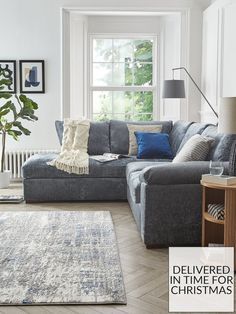 Colourful Cushions On Grey Sofa, Grey Blue Sofa Living Room, Blue And Grey Lounge, Neutral And Blue Living Room, Blue Grey Sofa, Blue And Grey Living Room, Blue Grey Living Room, Light Blue Living Room, Dark Gray Sofa