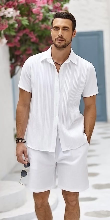 Get ready for beach vibes with our Men's Cotton Linen Sets! ☀️ These suits feature a short sleeve design with pleats and are made from a comfortable blend of cotton and linen. The Guayabera style adds a touch of sophistication and tropical charm. Perfect for beach parties or vacations 🕶️ #Fashion #Style #Men #Shirt #Beach #Summer #Pleats #Vibes #BeachVibes #Stylish #Charm #Relaxed #Look #Outfit #Relaxed #Trend #Fresh All White Summer Outfits Men, Groom Outfit Beach Wedding Shorts, Button Down Shirt And Shorts, Linen Texture Fabric, Silver Outfit, White Summer Outfits, Essential Wardrobe Pieces, Silver Outfits, Short Sleeve Design