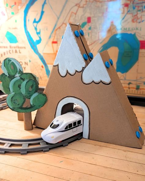 Jen Buchheit | Cardboard Mountain Train Tunnel with Makedo 🏔️ I stumbled upon a charming cardboard village crafted by Joann Fabrics and instantly fell… | Instagram Cardboard Mountain, Cardboard Mountains, Cardboard Tunnel, Cardboard Marble Run, Cardboard Train, Train Tunnel, Cardboard Car, Marble Run, Paper Ornaments