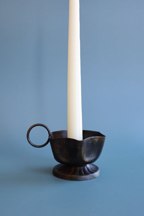 Like a charming piece of Victoriana unearthed at a hometown flea market, this candle holder is complete with a finger hold, adding to its vintage appeal. Each one is handmade in northern India using age-old techniques of the traditional metalsmith. 4.3" length x 3" width x 2" height. 100% sheet iron. Wipe clean or if washing dry thoroughly to avoid corrosion Old Candle Holders, Candle Holder Ceramic, Vintage Candlestick Holders, Antique Candle Sticks, Apothecary Candles, Iron Candlesticks, Old Candles, Relaxation Gifts, Mini Candles