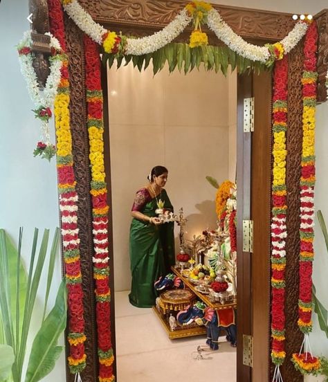 Diwali Decorations At Office Entrance, Home Warming Decorations Indian, Door Flower Decoration Entrance, Door Flower Decoration Indian, Gruhapravesam Decoration Ideas, Door Flower Decoration, Women Praying, Lakshmi Pooja, Home Flower Decor