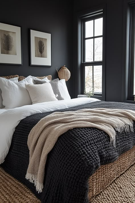 Black and grey bedroom ideas can create a surprisingly cozy and modern space. Explore plush bedding, textured throws, and soft lighting. Incorporate warm wood tones, metallic accents, and greenery for a balanced and inviting atmosphere. Black Wall Bedroom Bedding, Bedrooms With Black Windows, Grey Black Green Bedroom, Cozy King Size Bedroom Ideas, Charcoal Grey Bedding Ideas, Neutral Dark Bedroom, Black And Neutral Bedding, Dark Comfy Bedroom, Soft Black Bedroom