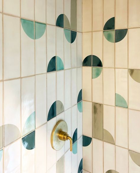 Subway tiles paired with handmade rectangular tiles can create a beautiful and interesting look in a shower. Bathroom Completely Tiled, Abstract Tiles Bathroom, Green Wall Tiles Bathroom, Green Floor Tile Bathroom, Graphic Tile Bathroom, Green Shower Tiles, Striped Bathroom Walls, Green Floor Tiles, Green Bathroom Tiles