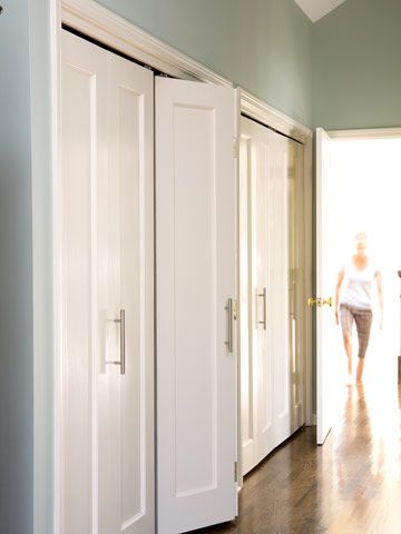 love the wall colour, love the floor stain, love the simple shaker doors...love what looks like Ikea kitchen door handles! Makes me miss our awesome custom closets in our old master - priority #1 for our new bedroom Ikea Kitchen Doors, Folding Closet Doors, Closet Door Handles, Closet Door Makeover, Hallway Closet, Bifold Closet Doors, Kitchen Door Handles, Hall Closet, Shaker Doors