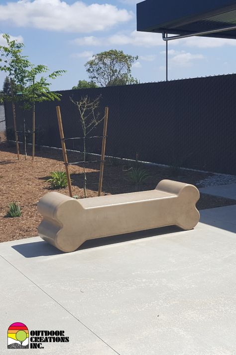 Concrete dog bone bench.  Durable and customizable. Dog Daycare Front Desk, Dog Store Ideas, Dog Cafe Design, Dog Shop Ideas, Vet Clinic Ideas, Dog Park Design, Dog Boutique Ideas, Dog Event, Veterinary Design