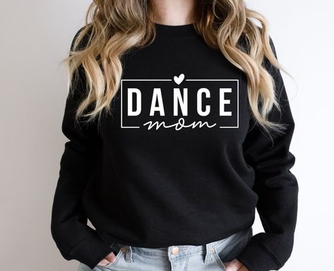 Shout-out to all the amazing Dance Moms out there!🎉 Are you the loudest cheerer in the crowd? The one with the proudest clap? We've got the perfect sweatshirt just for you! ⭐ Our 'Crazy Proud Dance Mom Sweatshirt' is a badge of honor for every mama who supports their dancer with heart and soul. It's comfy, stylish, and speaks volumes about your pride! 💃✨ Be competition ready and show the world how dance moms do it! Make some noise and click the link to get yours now: Ballet Svg, Dance Mom Svg, Dance Mom Shirt, Dance Sweatshirt, Dance Svg, Dance Mom Shirts, Christmas Dance, Dance Lover, Team Mom